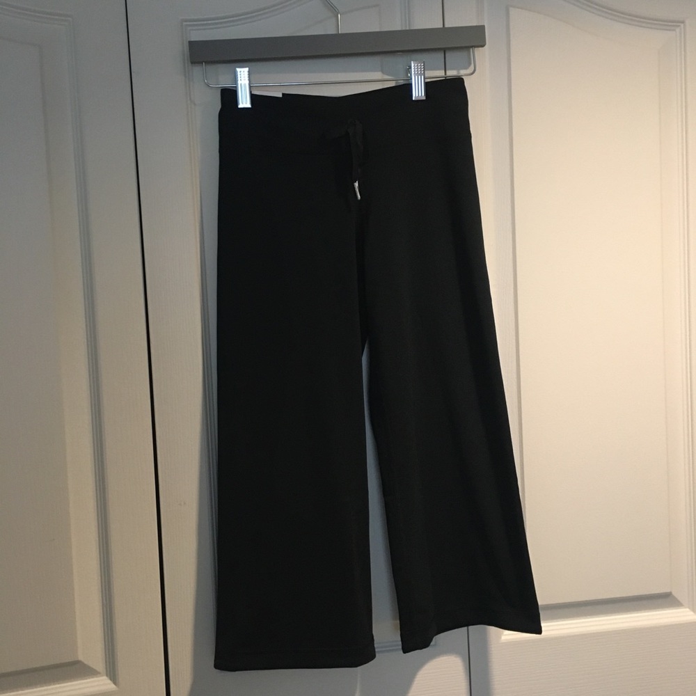NWT Under Armour Perfect Flow Capris for Ladies XS